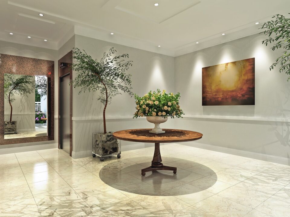 Hall de entrada sofisticado, com decoração impecável.